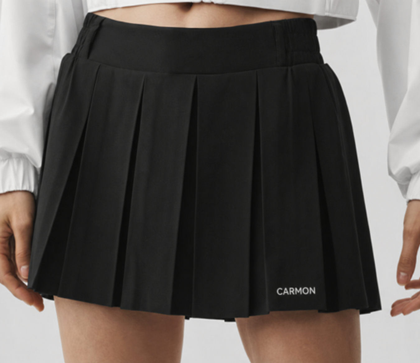 Falda negra plisada Carmon para mujer